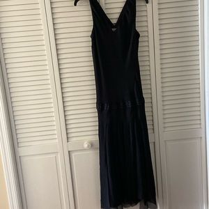 Sleeveless V-neck, dress, lined w/dropped waist w/cut flowing strips of fabric